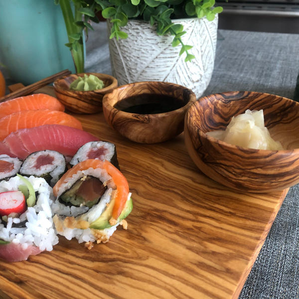 Olive wood Sushi serving board accommodating japanese delicacy